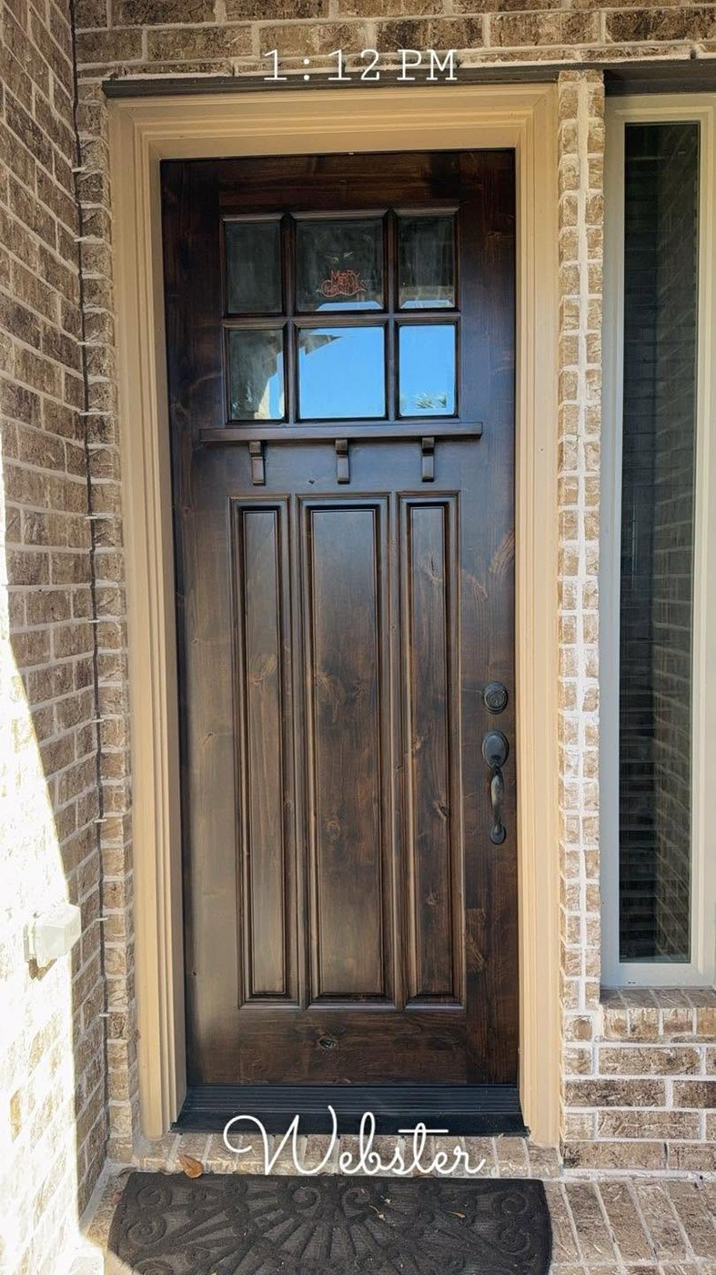 A craftsman entry door finished by Diego Monroy